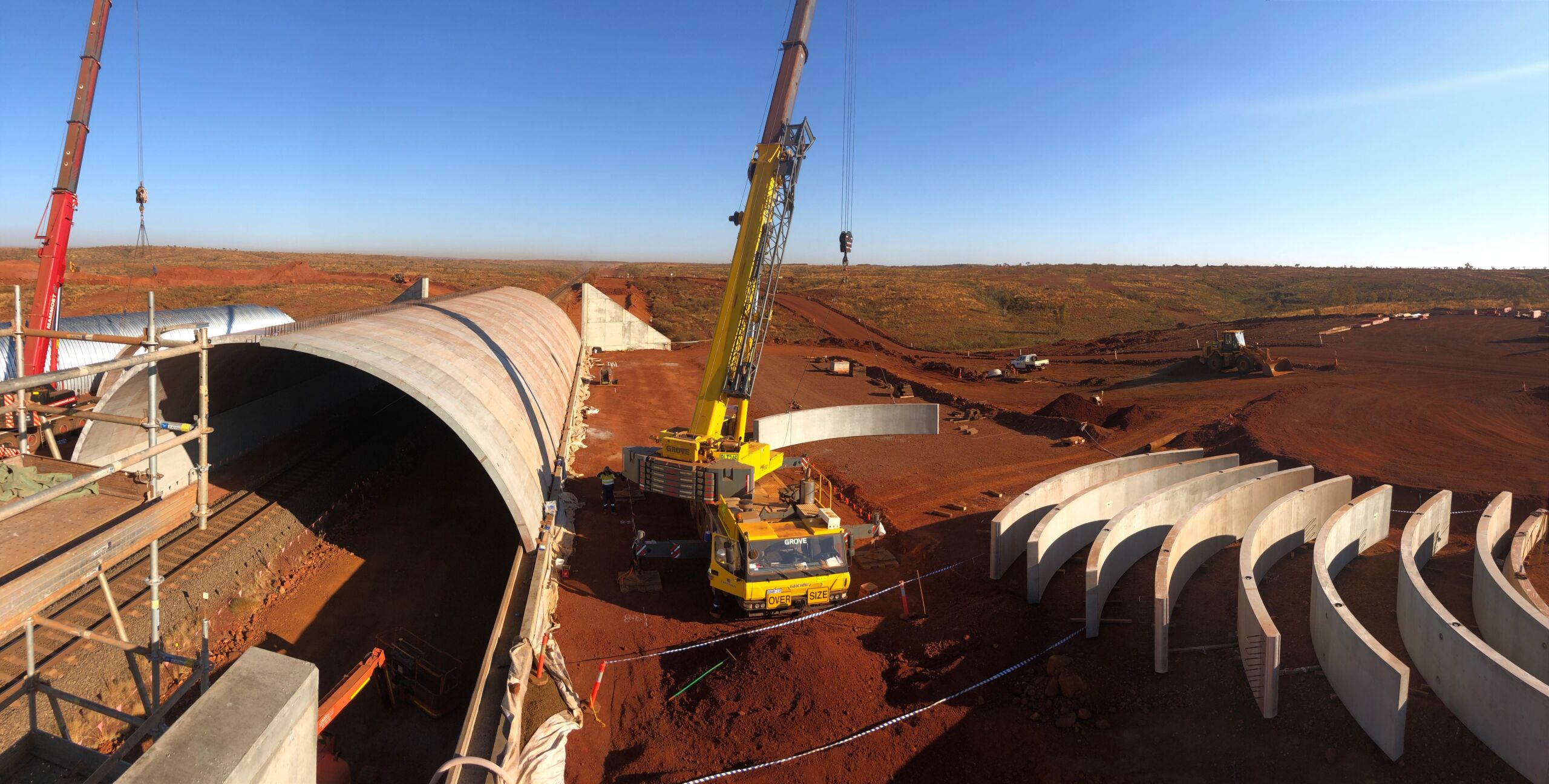 A TechSpan concrete precast arch being installed at a mining site in Western Australia for use as a tunnel.
